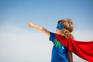 Little boy dressed like Superman an example of why abundant thinkers succeed with flying colors.